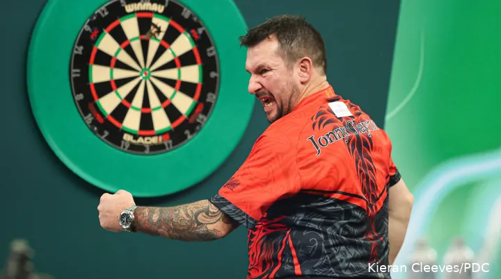 Jonny Clayton takes on Daryl Gurney in the third round of the PDC World Darts Championship.
