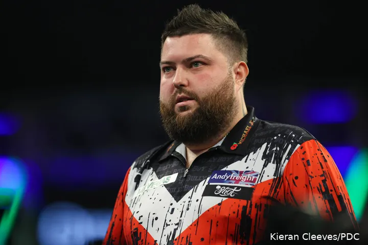 Michael Smith on the oche at the Grand Slam of Darts.