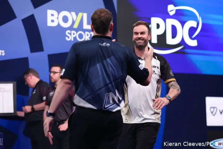 Ross Smith and Cameron Menzies shake hands ahead of their first round match at the 2026 World Grand Prix