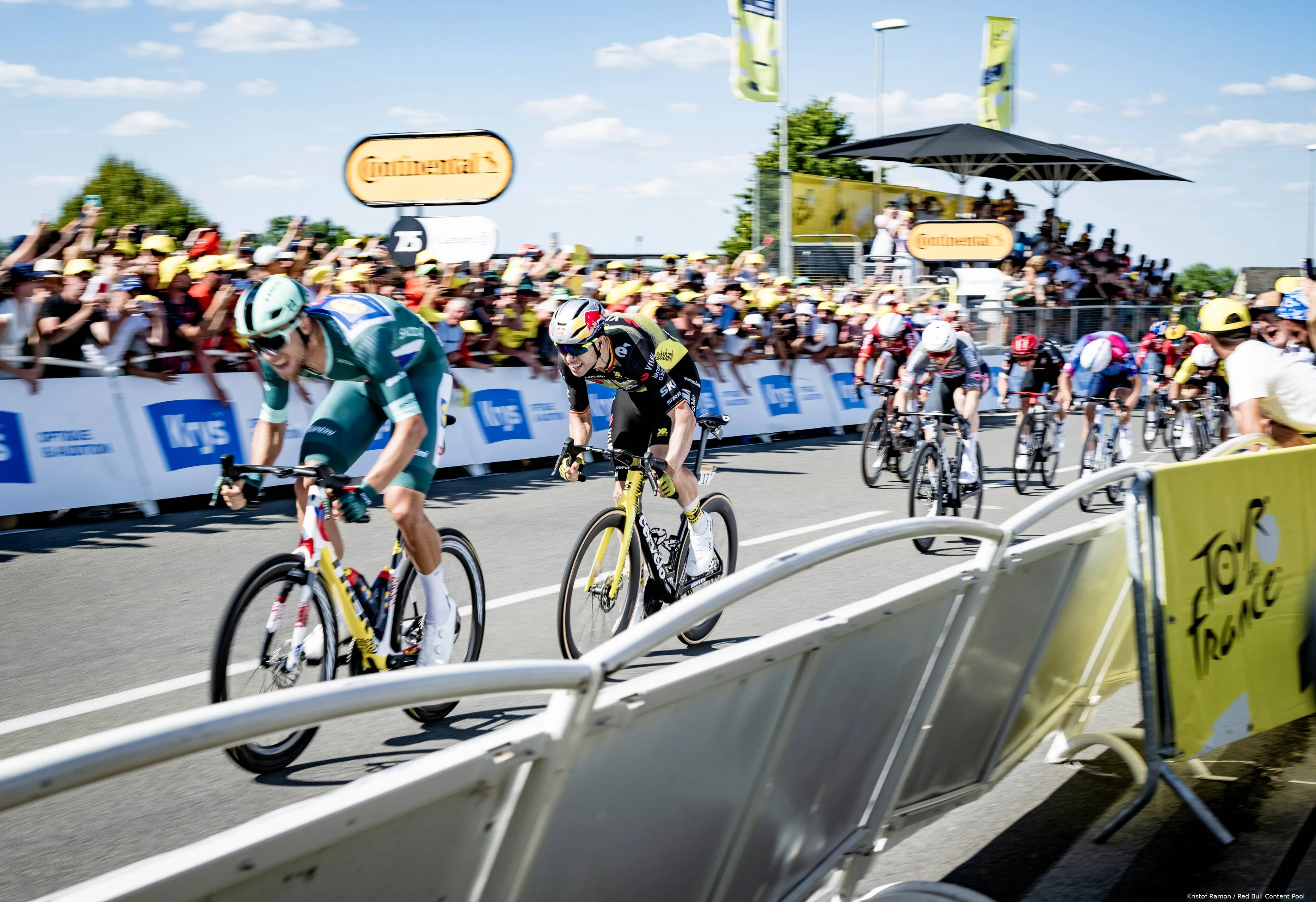 Wout van Aert and Jonathan Milan sprinting at the end of stage 8 of the 2025 Tour de France