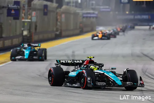 Lewis Hamilton, followed by George Russell, into turn 1 in the opening laps of the 2024 Singapore Grand Prix