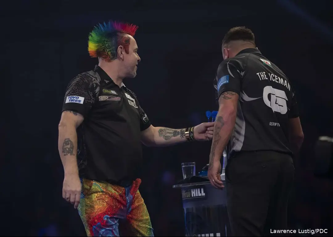 Manchmal sind die Haare des Schotten das Highlight seines Outfits. Mit einer Frisur in allen Farben des Regenbogens schlug er Price, um das Finale der Weltmeisterschaft 2020 zu erreichen.
