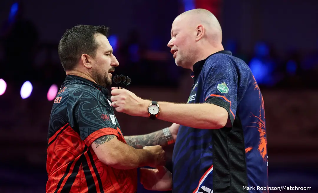 Jonny Clayton and Raymond van Barneveld on stage at Winter Gardens