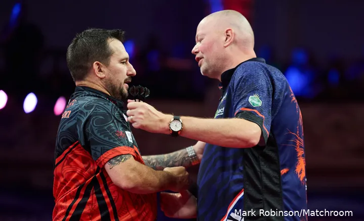 Jonny Clayton and Raymond van Barneveld on stage at Winter Gardens