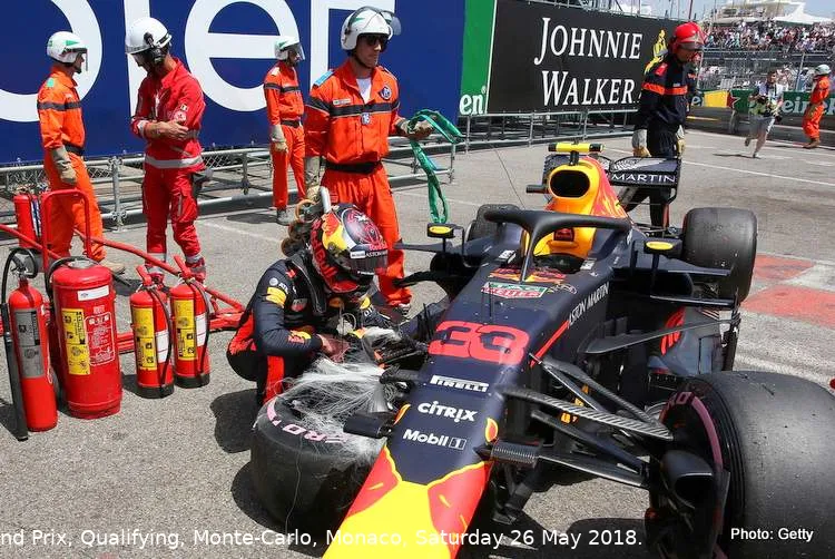 1 f1 monaco gp 2018 max verstappen red bull racing rb14 looks at his crashed car