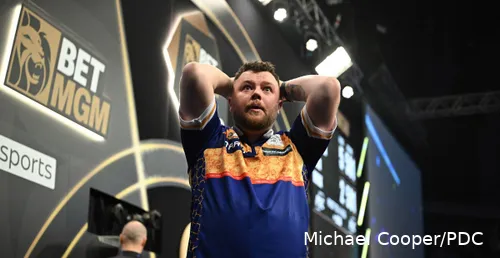 Josh Rock cannot believe he has just hit a nine-darter