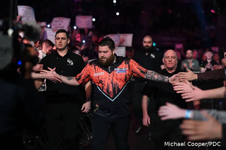 Michael Smith in action in the Premier League Darts