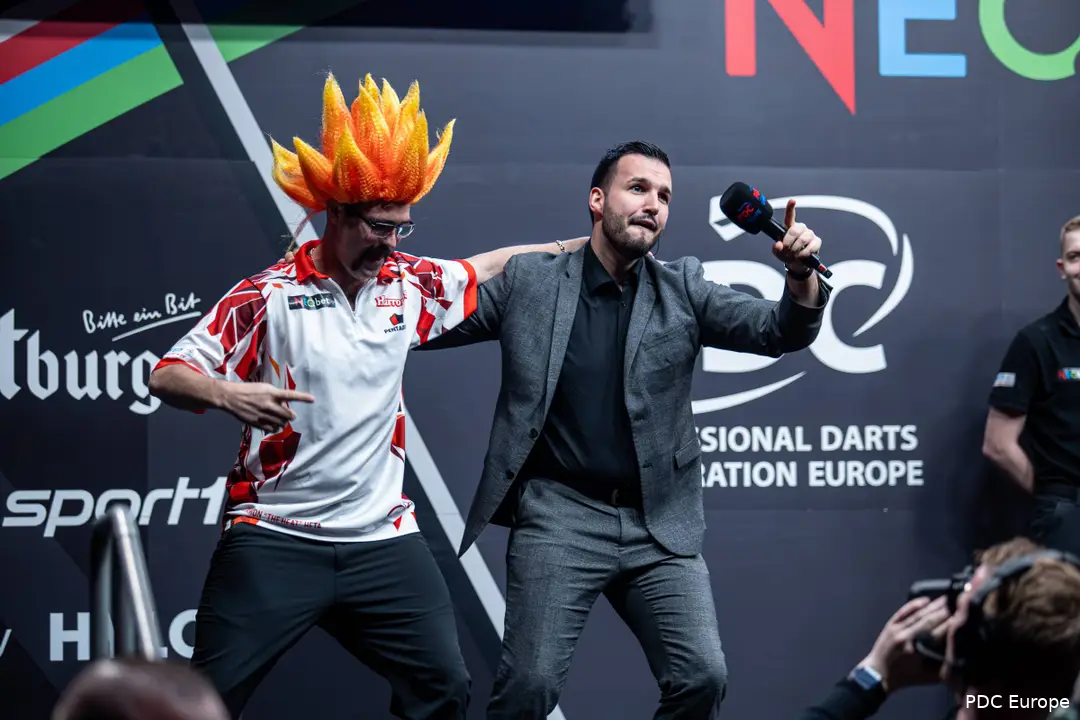 Philip Brzezinski and Damon Heta dance together on stage during the walk-on.