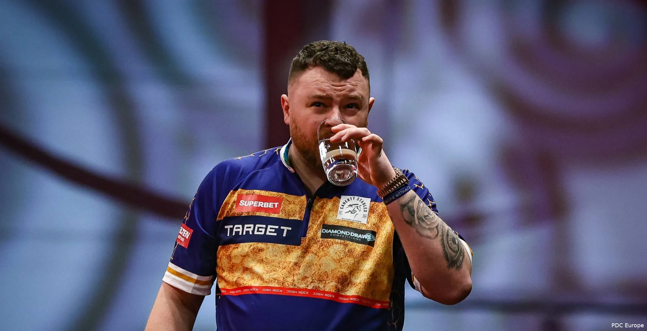 Josh Rock takes a sip of water.