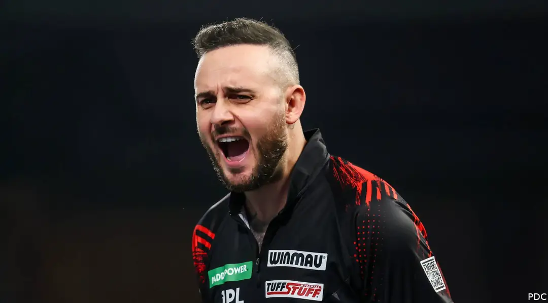 Joe Cullen screams on stage.