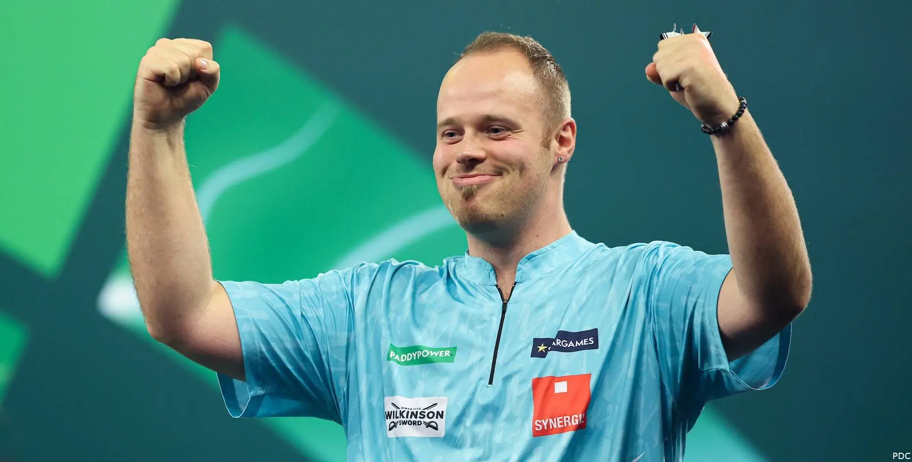 Max Hopp beams on the Alexandra Palace stage