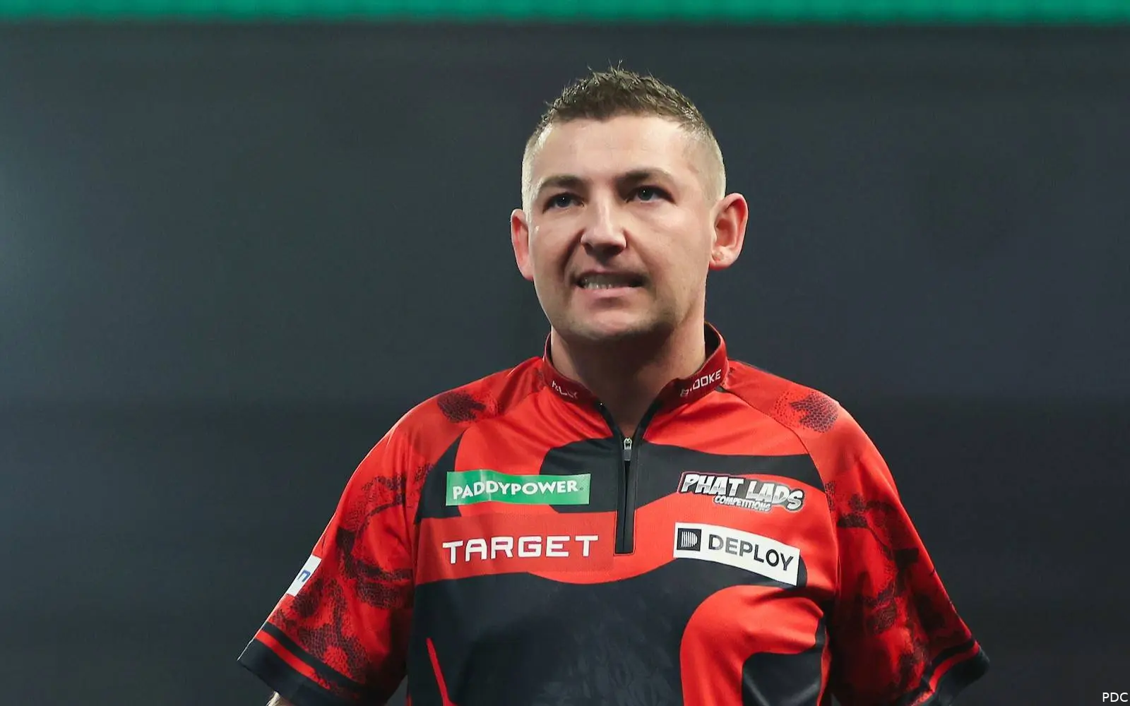 Nathan Aspinall walking off stage disappointed