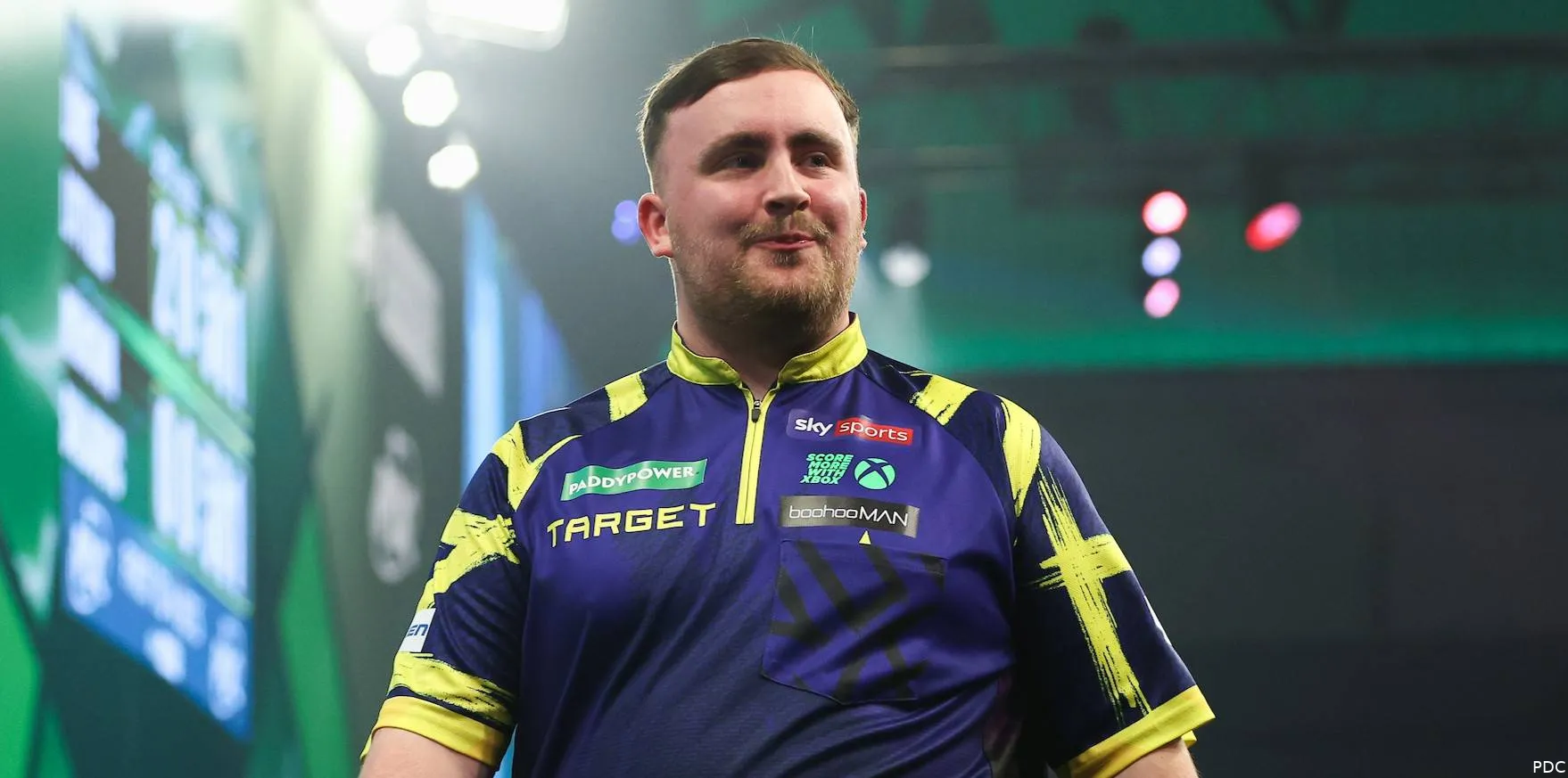 Luke Littler walks off the stage