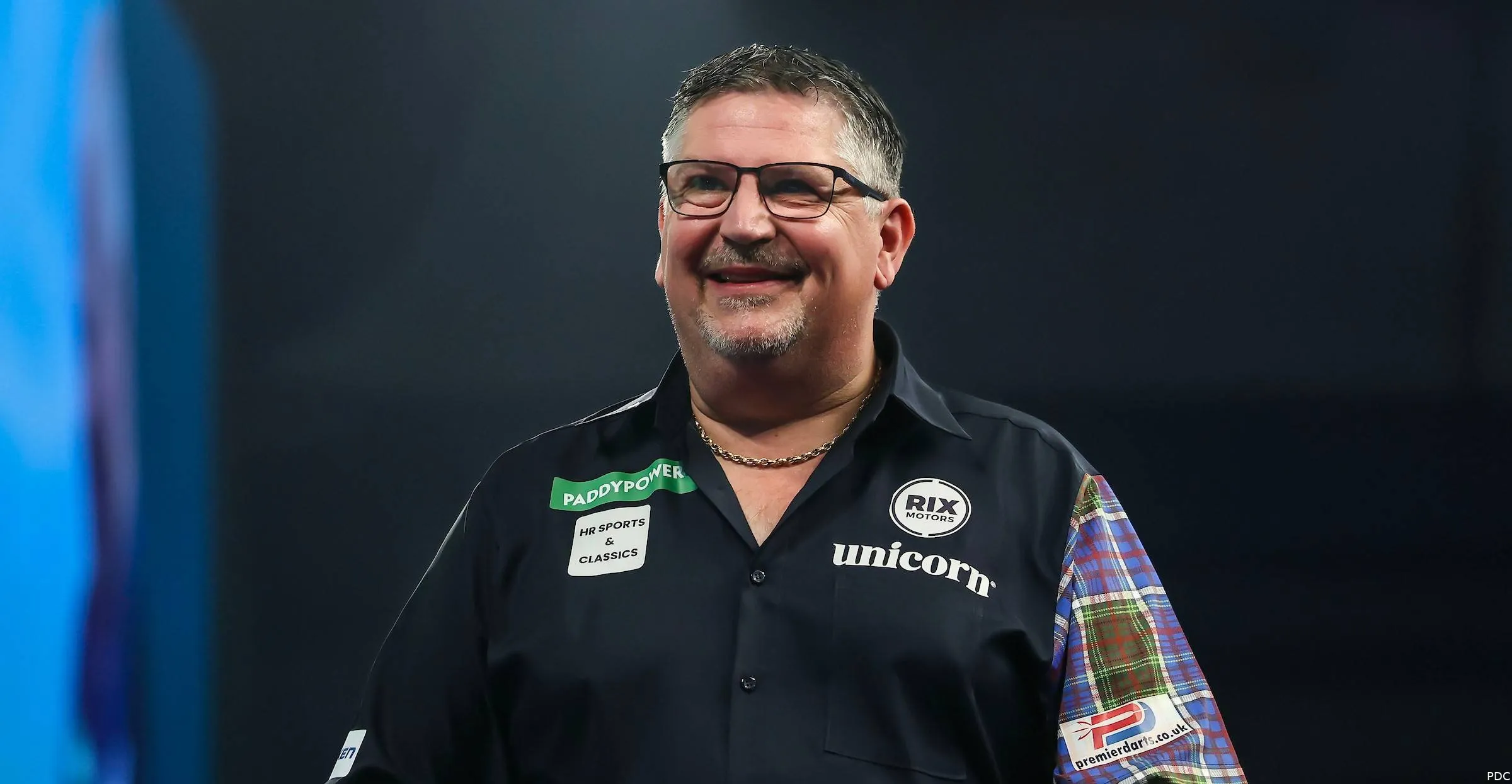 Gary Anderson smiling on the Ally Pally stage