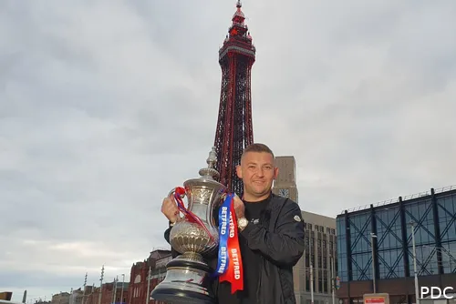 Nathan Aspinall with his title and the newly adorned Blackpool Tower.