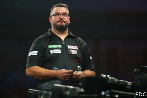 Cristo Reyes looks on.