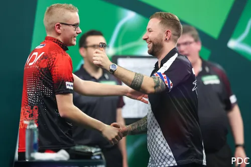 Noppert and Van der Velde go in for a hug.