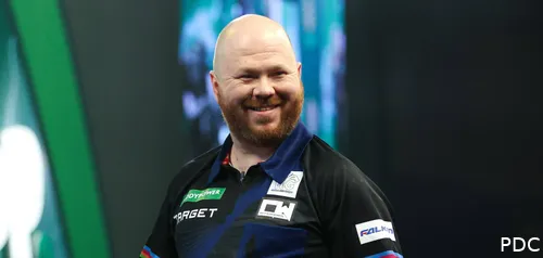 Justin Hood smiles at camera.