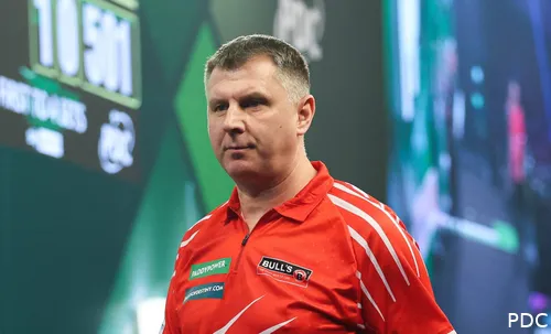 Krzysztof Ratajski walks off stage.