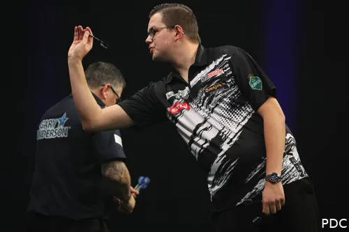 Gian van Veen in action against Gary Anderson at the 2026 World Darts Championship