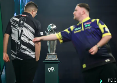 Luke Littler and Gian van Veen in action during the World Darts Championship final