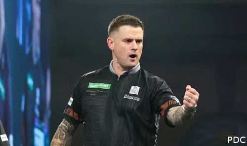 Luke Woodhouse pumps his fist toward the crowd