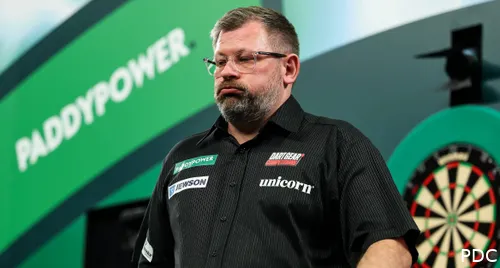 James Wade puffs out his cheeks.