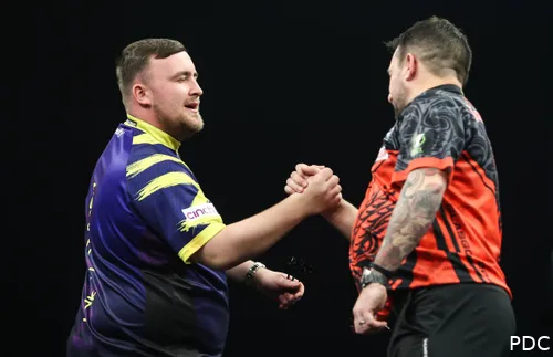 Luke Littler and Jonny Clayton shake hands ahead of their match on night 3 of the 2026 Premier League Darts in Glasgow