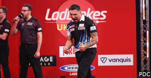 Gerwyn Price pumps his fists