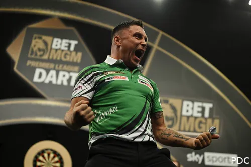Gerwyn Price celebrates at length towards the crowd.