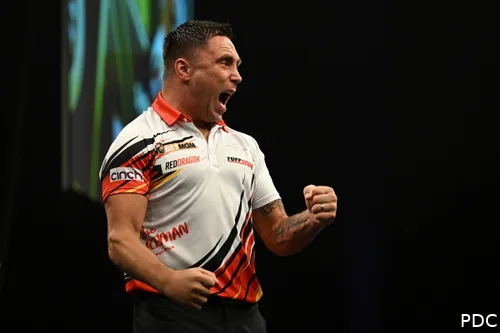 Gerwyn Price pumps his fists on stage