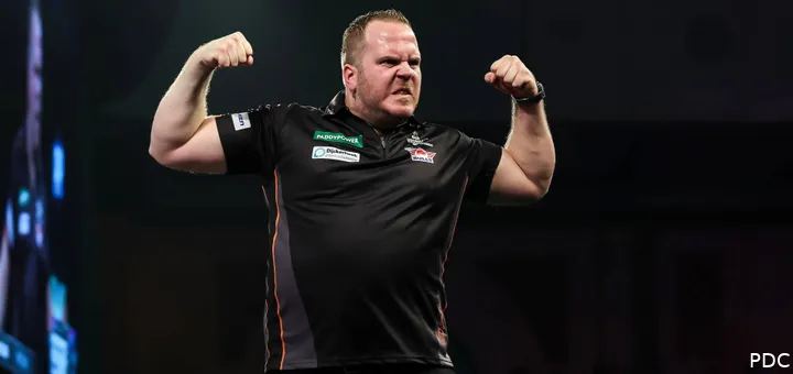 Dirk van Duijvenbode flexes his biceps.