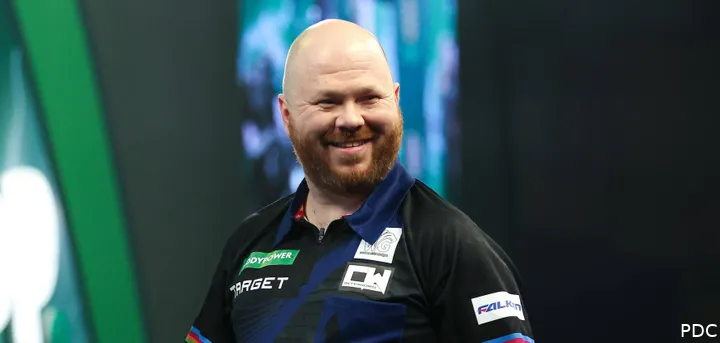 Justin Hood smiles at camera.