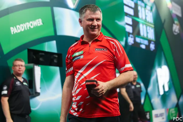 Krzysztof Ratajski steps off the stage with a smile