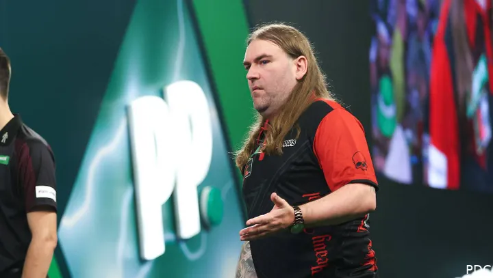Ryan Searle pulls a funny face and raises his hand