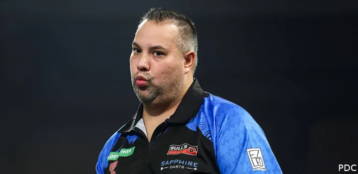 Jermaine Wattimena purses his lips and looks visibly frustrated.