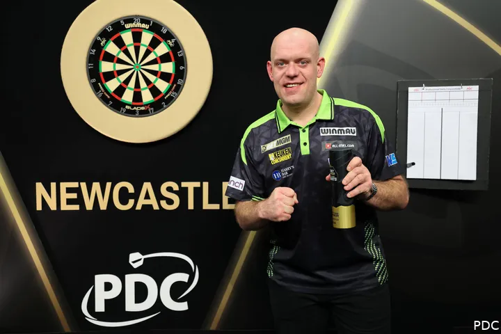 Michael van Gerwen poses with his trophy after winning Night One of the 2026 Premier League Darts