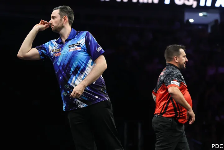 Humphries throws the dart.