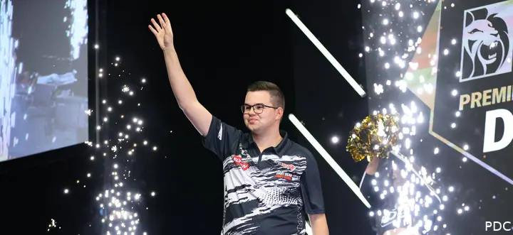 Gian van Veen waves to the crowd during his Premier League Darts walk-on