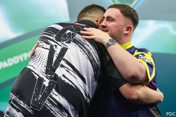 Gian van Veen and Luke Littler embrace after the World Championship final