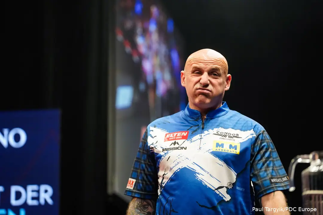 Alan Soutar pulling a face while walking off stage
