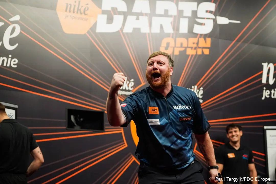 Cameron Menzies shakes fist in celebration.