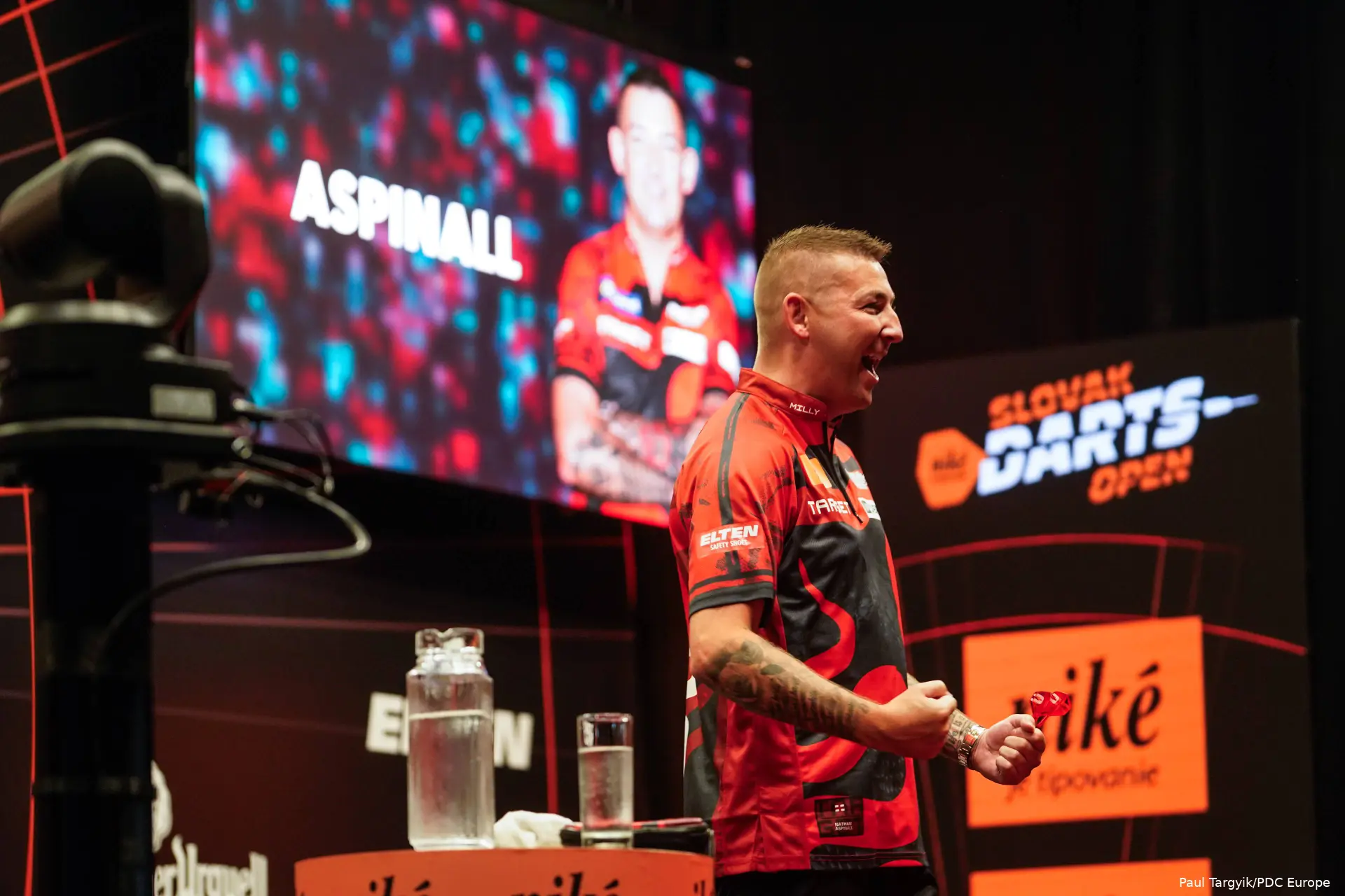 Nathan Aspinall celebrates.