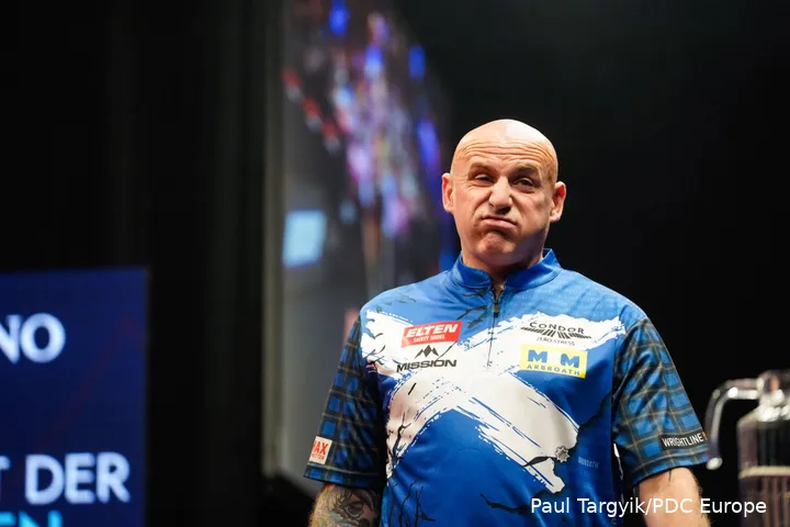 Alan Soutar pulling a face while walking off stage