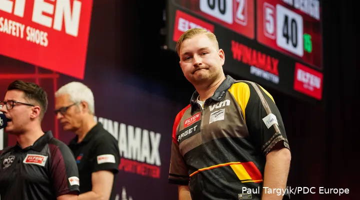 Dimitri Van den Bergh looks on at Baltic Sea Darts Open.