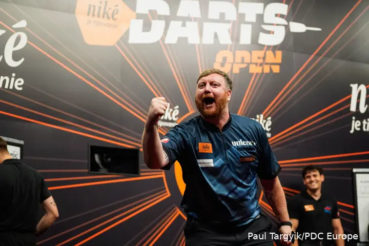 Cameron Menzies shakes fist in celebration.