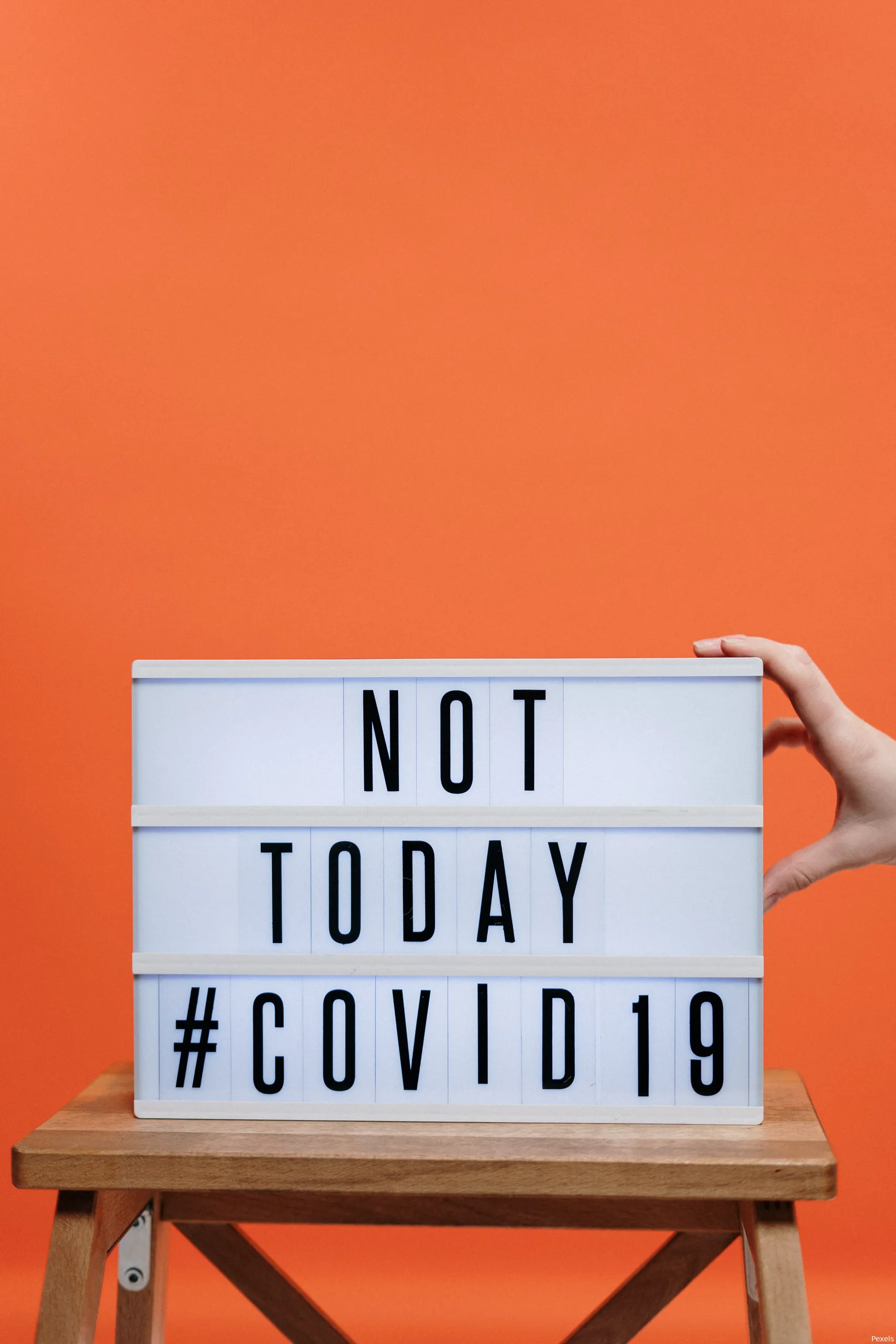 not today covid19 sign on wooden stool 3952231