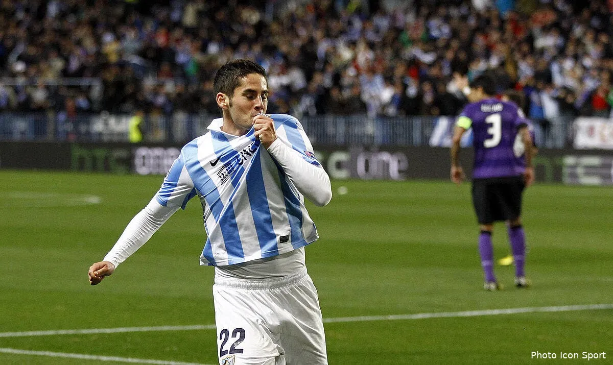 arsenal frole l exploit malaga chez les grands iconsport ar 130313 01 01 152189