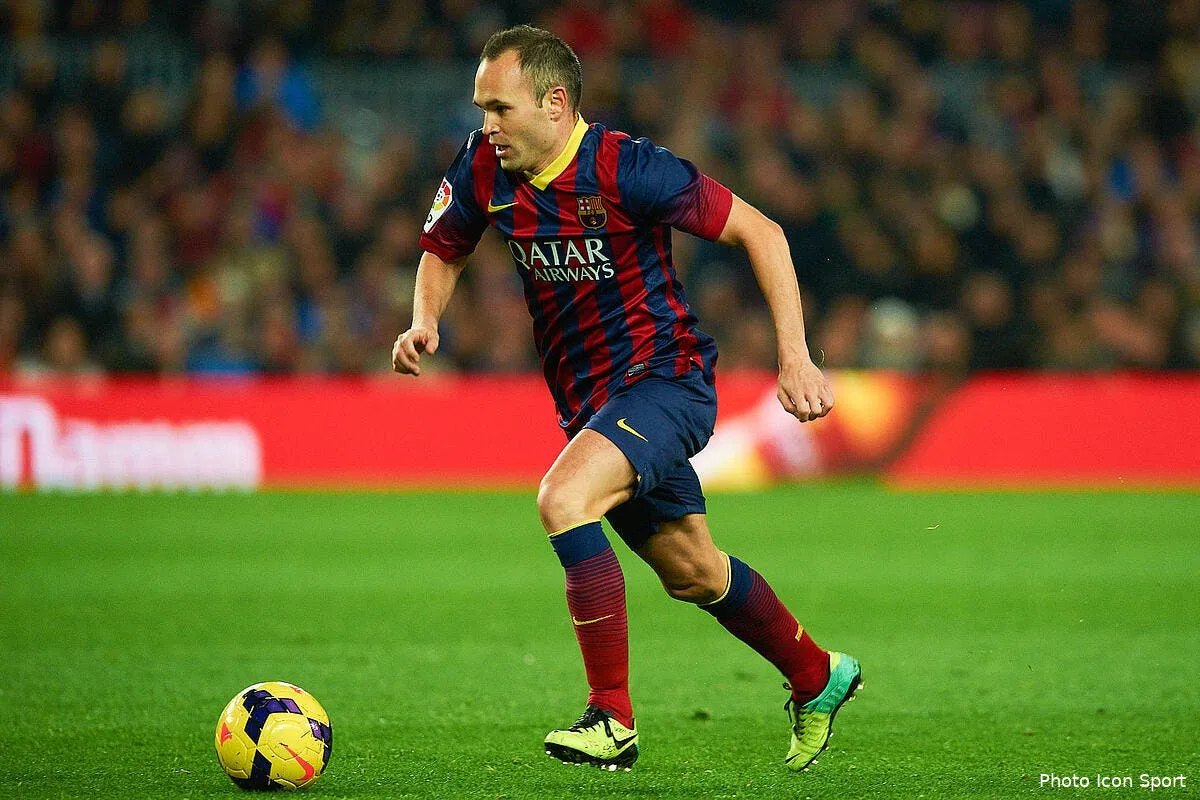 iniesta prolonge a barcelone jusqu en 2018 iconsport dpa 141213 08 0272381