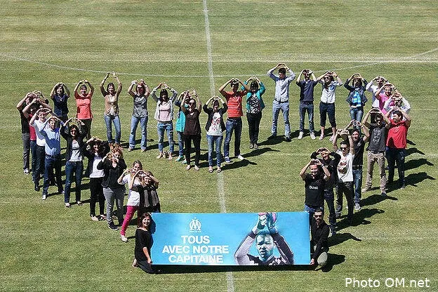 une photo et mandanda pourrait rester a l om 7798183979